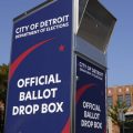 Voters can drop off absentee ballots at a ballot drop box in Detroit instead of using the mail.