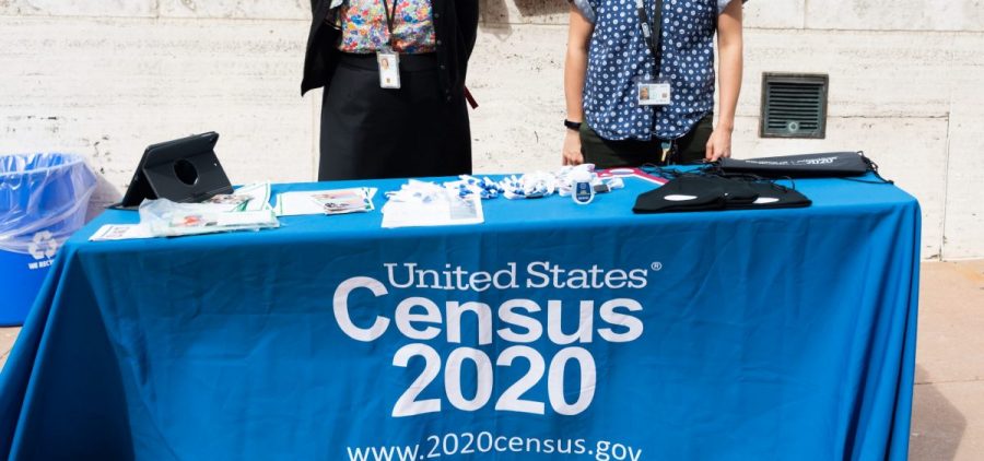 U.S. Census Bureau workers stand outside Lincoln Center in New York City in September. A federal judge has ordered the bureau to keep counting for the 2020 census through Oct. 31 for now.