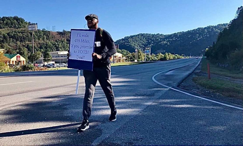 Activist Devine Carama on his walk through Kentucky communities.