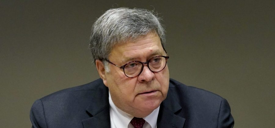 U.S. Attorney General William Barr meets with members of the St. Louis Police Department on Oct. 15. On Monday night, Richard Pilger resigned as director of the Justice Department's election crimes branch, protesting Barr's memo authorizing federal prosecutors to pursue allegations of voting irregularities.