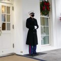 A Marine stands outside the West Wing of the White House last week. President Trump has been lobbied by advocates to use his powers to grant pardons and commutations ahead of leaving office.