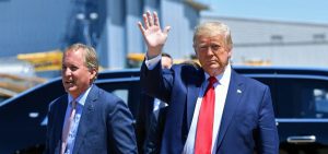 Texas Attorney General Ken Paxton, seen here with President Trump in June in Dallas, sued four states that Joe Biden carried in the general election, claiming their changes to election procedures during the pandemic violated federal law.