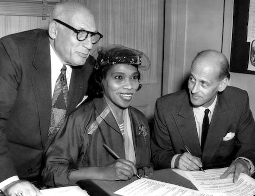 Singer Marian Anderson signs a contract with Metropolitan Opera representative Rudolf Bing