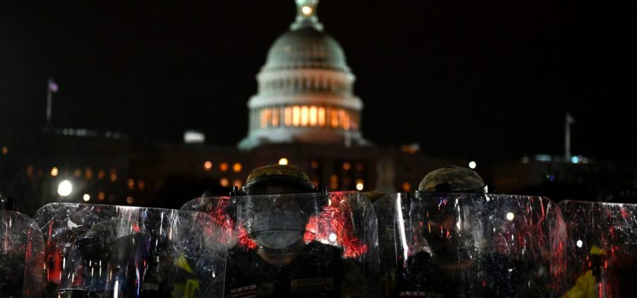 Members of the D.C. National Guard are deployed outside of the U.S. Capitol on Wednesday evening. Supporters of President Trump stormed a session of Congress earlier Wednesday.