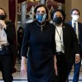 House Speaker Nancy Pelosi, D-Calif., said that impeaching President Trump is "a constitutional remedy that will ensure that the republic will be safe from this man." She's seen here walking to the House floor on Wednesday, ahead of the vote.