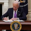 President Biden, joined by Vice President Harris and Dr. Anthony Fauci, signs executive actions as part of his administration's COVID-19 response on Thursday.
