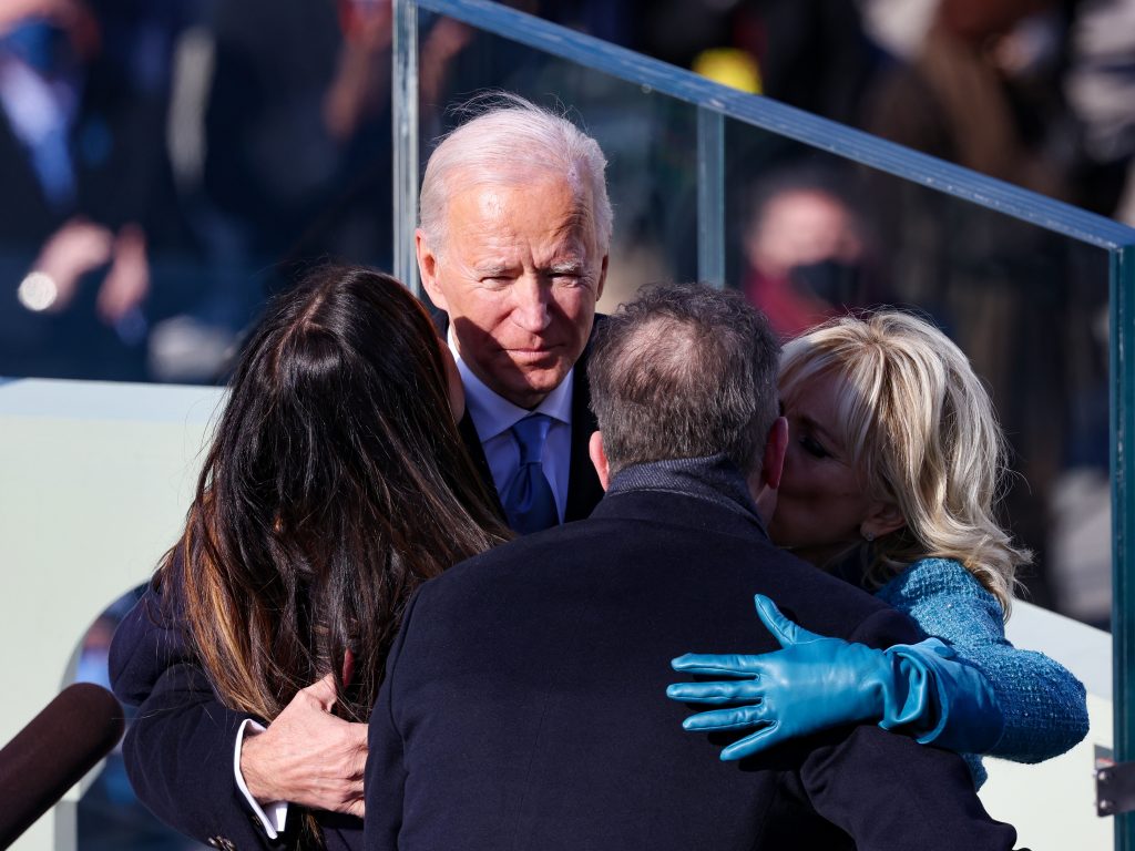 President Biden and first lady Jill Biden hug Hunter Biden and daughter Ashley Biden after being sworn in as U.S. president.