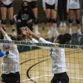 Ohio Volleyball vs Buffalo: Caitlin O'Farrell (12) and Mariana Rodrigues (5) jump to block a hit from Courtney Okwara (12). (Photo: Evann Figueroa/WOUB)