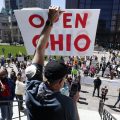 This Monday, April 20, 2020 file photo shows protesters gathering outside of the Ohio State House in Columbus, Ohio to protest the stay home order.
