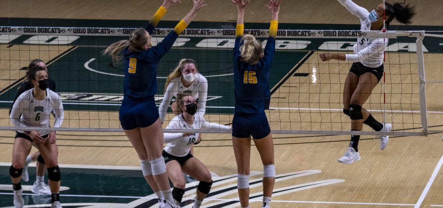Mariana Rodrigues (5) tries to score past Olivia Vance (9) and Payton Morman (16) in Ohio's match against Toledo on March 17, 2021. (Photo: Evann Figueroa/WOUB)