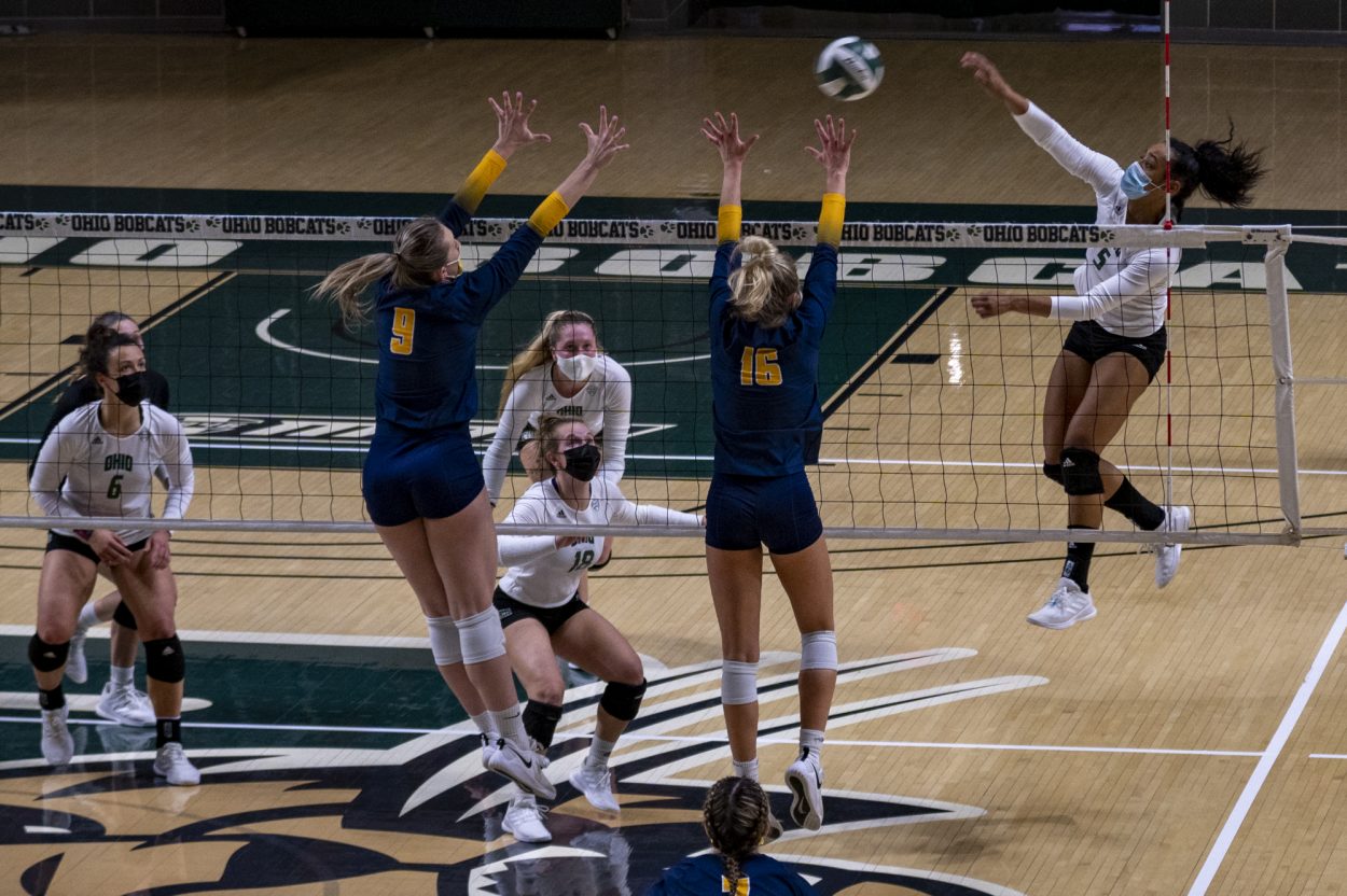 Mariana Rodrigues (5) tries to score past Olivia Vance (9) and Payton Morman (16) in Ohio's match against Toledo on March 17, 2021. (Photo: Evann Figueroa/WOUB)