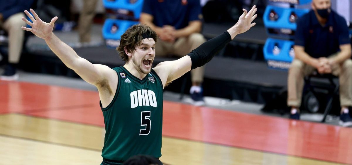 Ben Vander Plas #5 of the Ohio Bobcats celebrates during the closing seconds of their 62-58 win over the Virginia Cavaliers in the first round of the 2021 NCAA Division I Men's Basketball Tournament held at at Simon Skjodt Assembly Hall on March 20, 2021 in Bloomington, Indiana.