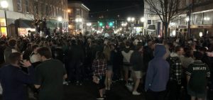 Students on Court Street after OU's win in the NCAA Men's Basketball Tournament Saturday, March 20