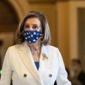 House Speaker Nancy Pelosi of California walks from the House floor during the vote on the $1.9 trillion COVID-19 relief bill Wednesday. Despite Republican criticism, Pelosi insists the bill is "coronavirus-centric."