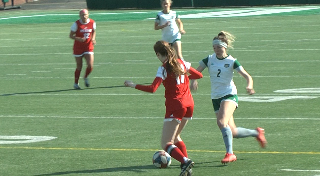 Ohio's Paige Knorr (2) goes for the ball in the Bobcats' match against Miami (OH) on March 4, 2021 at Peden Stadium.