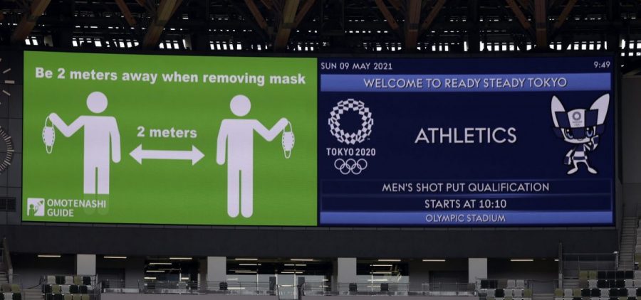 Signs on a screen are shown before an athletics test event for the Tokyo 2020 Olympic Games last month at the National Stadium in Tokyo.