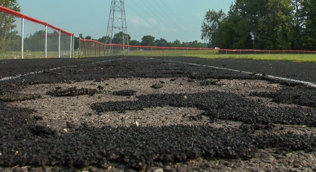 The rubber coating on the track at Alexander is badly deteriorated, posing risks for student athletes and threatening the future of the track program.