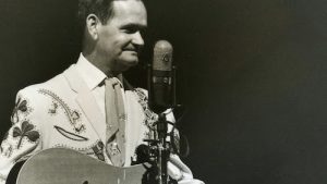 1950's Country Music singer in front of mic