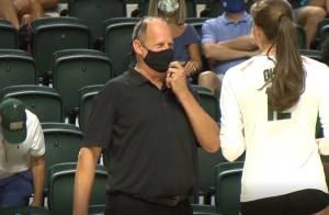 Ohio volleyball head coach Geoff Carlston talks with Caitlin O'Farrell (12) on the sideline in Ohio's exhibition match with Duquesne on August, 21, 2021 at the Convocation Center