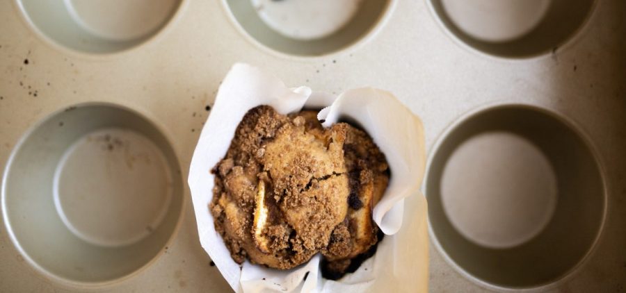 An apple cinnamon muffin is seen in Café Doorstep owner Daniel Palmer’s home kitchen in Athens, Ohio, on Sunday, Sept. 19, 2021. [Joseph Scheller | WOUB]