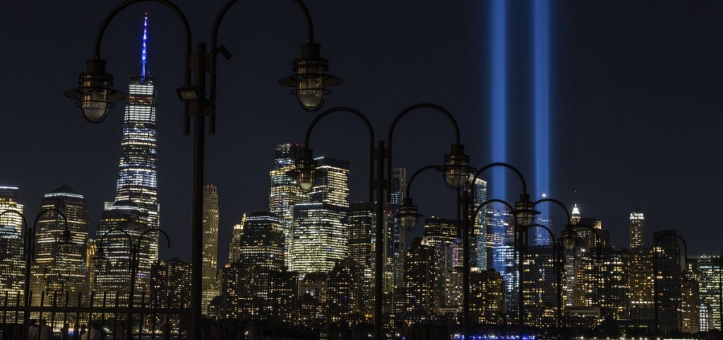 Tribute in Light, two vertical columns of light representing the fallen towers of the World Trade Center shine against the lower Manhattan skyline on the 19th anniversary of the September 11, 2001 terror attacks, seen from Jersey City, N.J., Friday, Sept. 11, 2020.