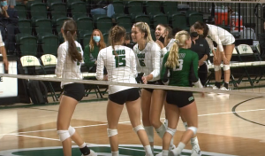 The Ohio volleyball team huddles on the court during their match against Toledo on Sept. 25, 2021 at the Convocation Center.