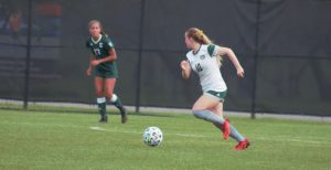Ohio's Haley Miller (10) dribbles the ball towards the goal in the Bobcats' match with Eastern Michigan on Thursday, Oct. 21, 2021 at Chessa Field. [Payton Brooker | WOUB]