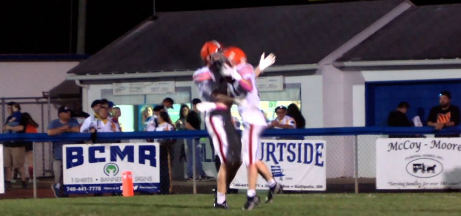 Two Ironton offensive players celebrate a touchdown over Galia