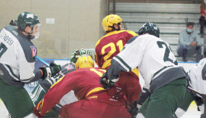 Players for Ohio and Iowa State battle for a loose puck in the front of the net on Friday, Oct. 15, 2021. [Jensen Knecht | WOUB]