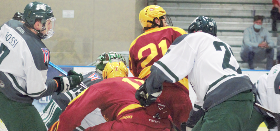 Players for Ohio and Iowa State battle for the puck in front of the net in their game at Bird Arena on Friday, Oct. 15, 2021.