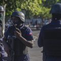 Armed forces secure the area where Haiti's prime minister, Ariel Henry, placed a bouquet of flowers in front of a memorial to independence hero Jean-Jacques