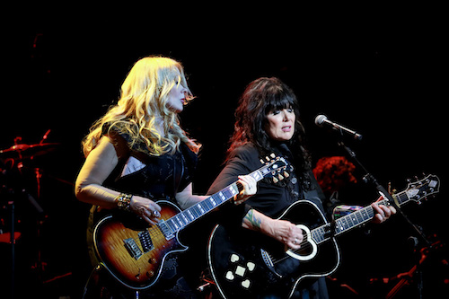 Left to right: Nancy Wilson and Ann Wilson of Heart in concert