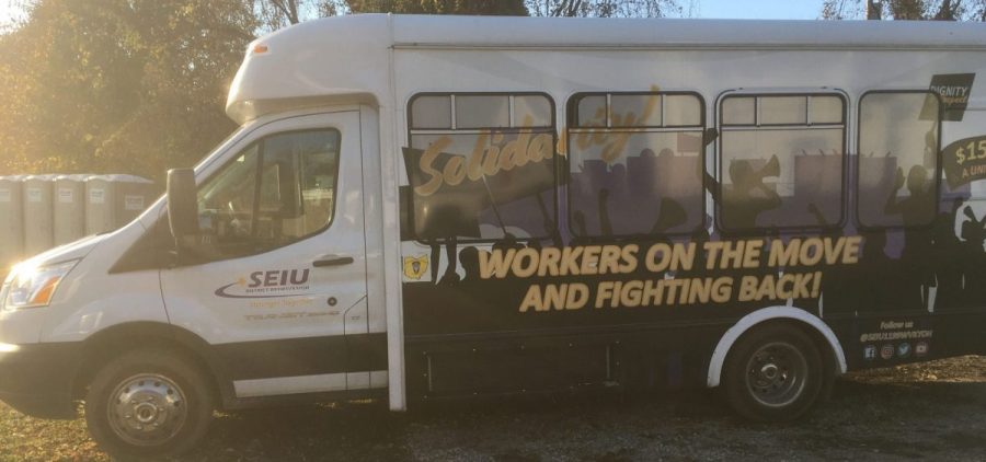 A passenger van is decorated with messages of solidarity for striking workers