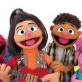 Sesame Street muppets with new asain american character Ji-Young