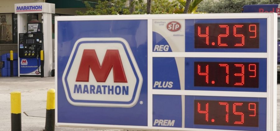 Gasoline prices are seen on Nov. 17 in Miami Beach, Fla.