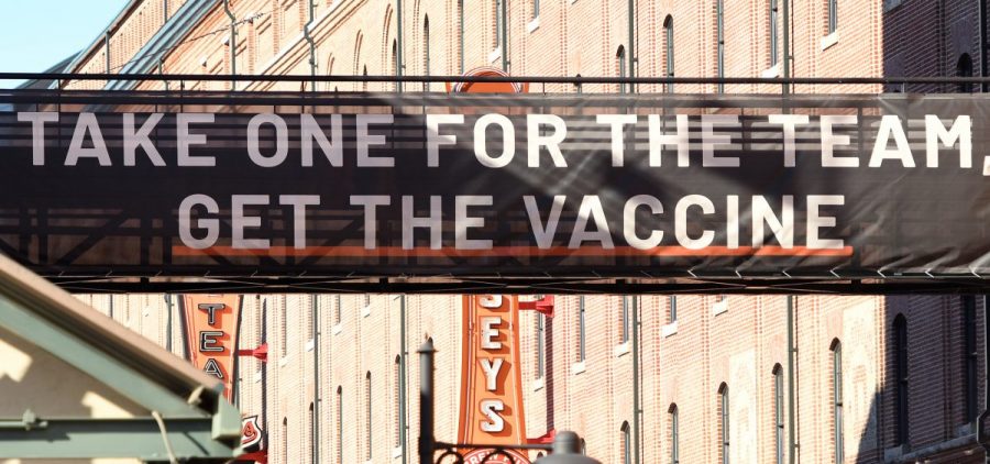 A sign outside Camden Yards in Baltimore, Maryland, encourages people to get a COVID-19 vaccine.
