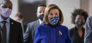 House Speaker Nancy Pelosi, D-Calif., arrives at the Capitol Thursday to update reporters on the must-pass priority of funding the government.