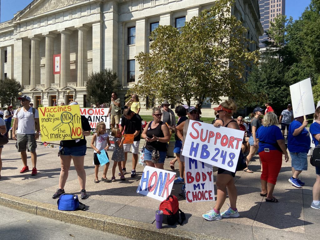 Protesters protesting covid vaccines at the ohio statehouse