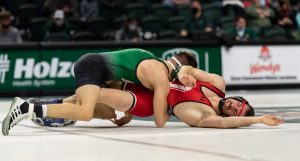 Bobcat Giovanni DiSabato attempts to pin Kyle Gorant of Davidson College at the Convocation Center in Athens, Ohio, on Sunday, Jan. 23, 2022. [Alex Eicher | WOUB]