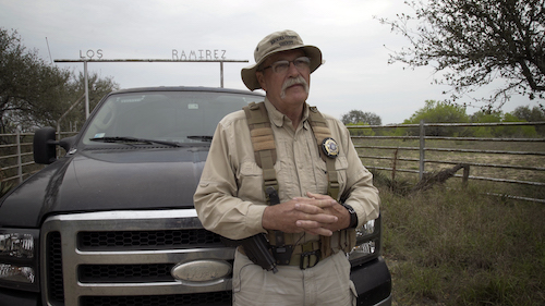 Sheriff’s Deputy outside a ranch in Texas