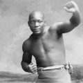 Boxer Jack Johnson posing