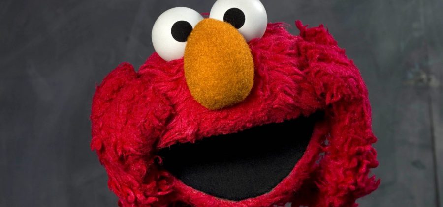 Elmo from Sesame Street posing for a portrait