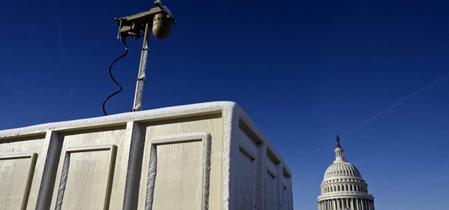 Newly installed surveillance cameras are positioned near the U.S. Capitol