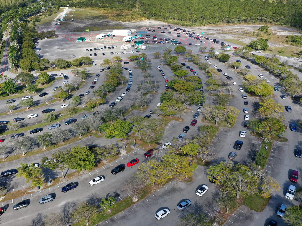 In an aerial view, cars line up at the COVID-19 testing site at Zoo Miami site last Wednesday.