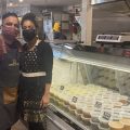 Juby George stands with his wife Shireen Bethala-George at the soft opening of Smell the Curry, a south Indian takeout and catering business at the Flourtown Farmers Market outside Philadelphia