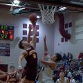 Meigs and Vinton Country players go up for a free rebound ball
