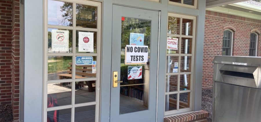 A "No COVID tests" sign on front doors of Powell, Ohio library