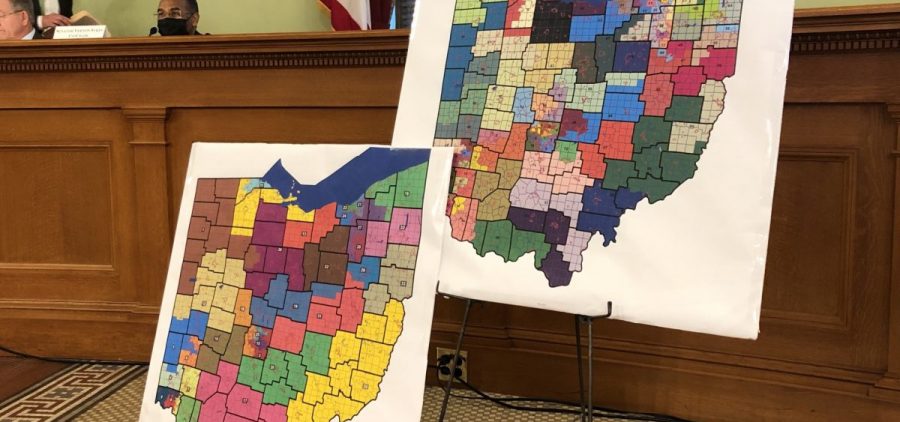 Two maps at a redistricting hearing