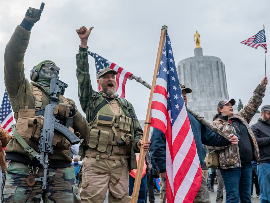 Armed supporters of President Donald Trump chant during a protest on Jan. 6, 2021 in Salem, Ore.