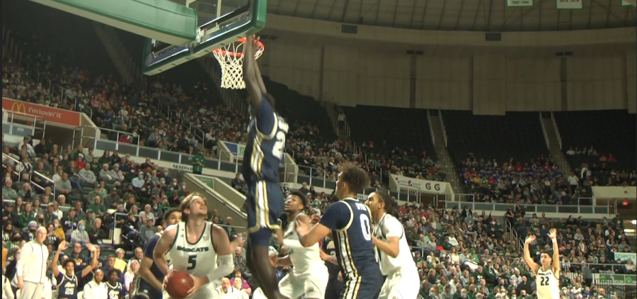 Ohio's Ben Vander Plas attempts a layup in the first half of the Bobcats' game against Akron on Feb. 25, 2022.